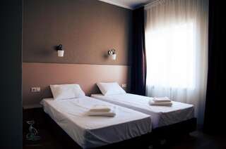 Отель Пеликан Сочи Двухместный номер с 1 кроватью или 2 отдельными кроватями и видом на море-4